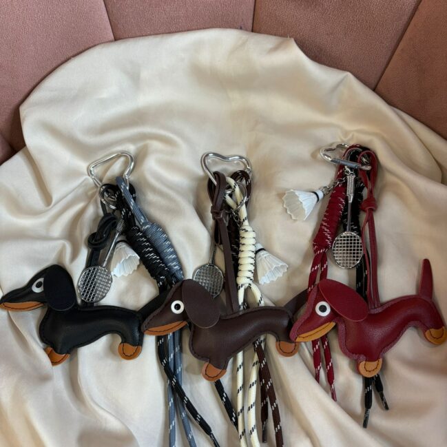 Charm corda bassotto con racchetta